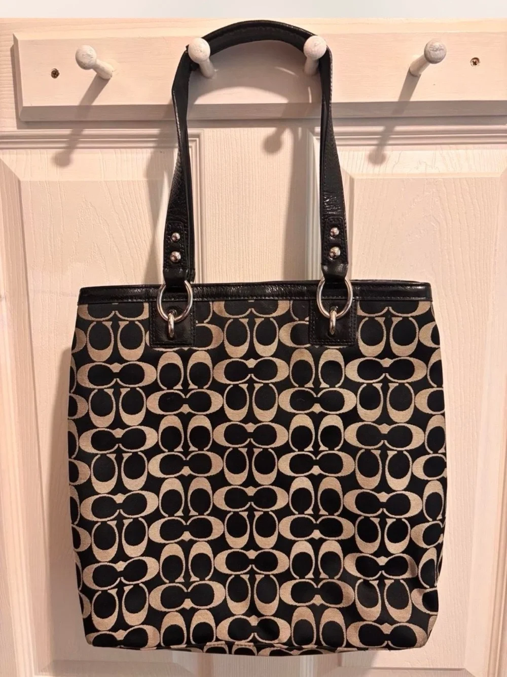 Coach Black and Beige Signature Tote with Front Turn-Lock Pocket